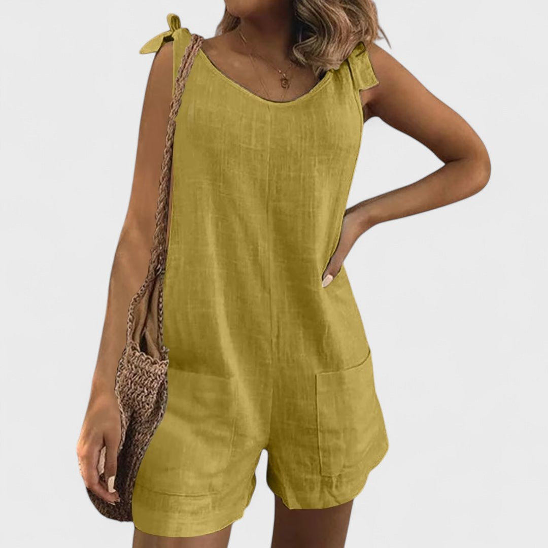 Maia | Tuta corta con tasche sulle spalle e lacci