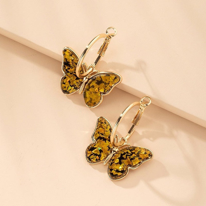 Orecchini unici dipinti a mano a forma di farfalla con smalto e cristallo – un tocco elegante per tutti i tuoi outfit