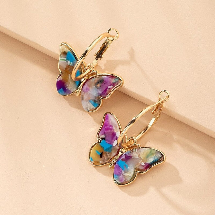 Orecchini unici dipinti a mano a forma di farfalla con smalto e cristallo – un tocco elegante per tutti i tuoi outfit