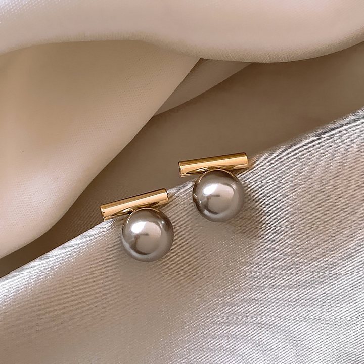 Orecchini eleganti e larghi con perle in oro – brillantezza e stile eccezionali